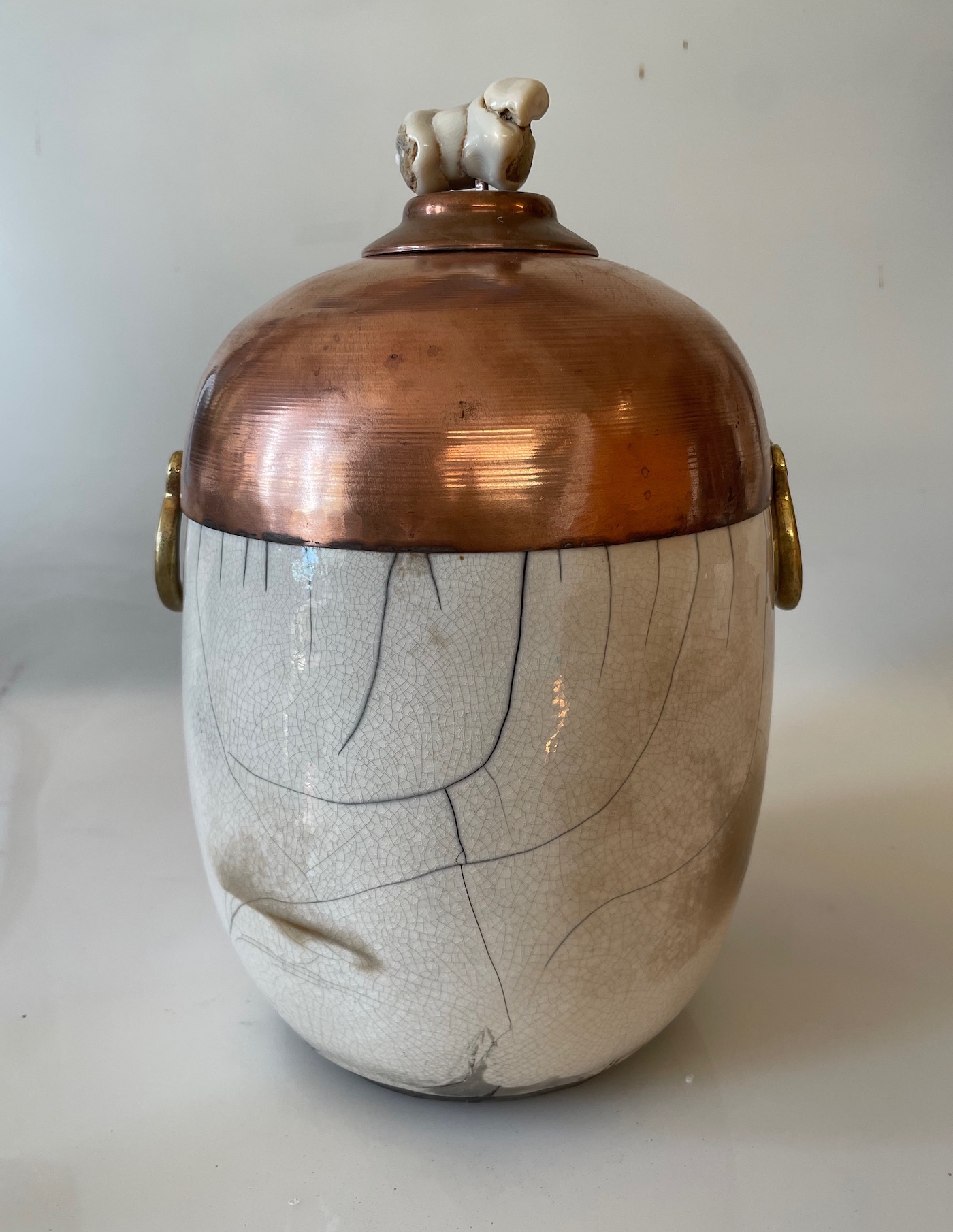 Hand-built white stoneware with clear crackle glaze and found copper bowl repurposed topped with white coral